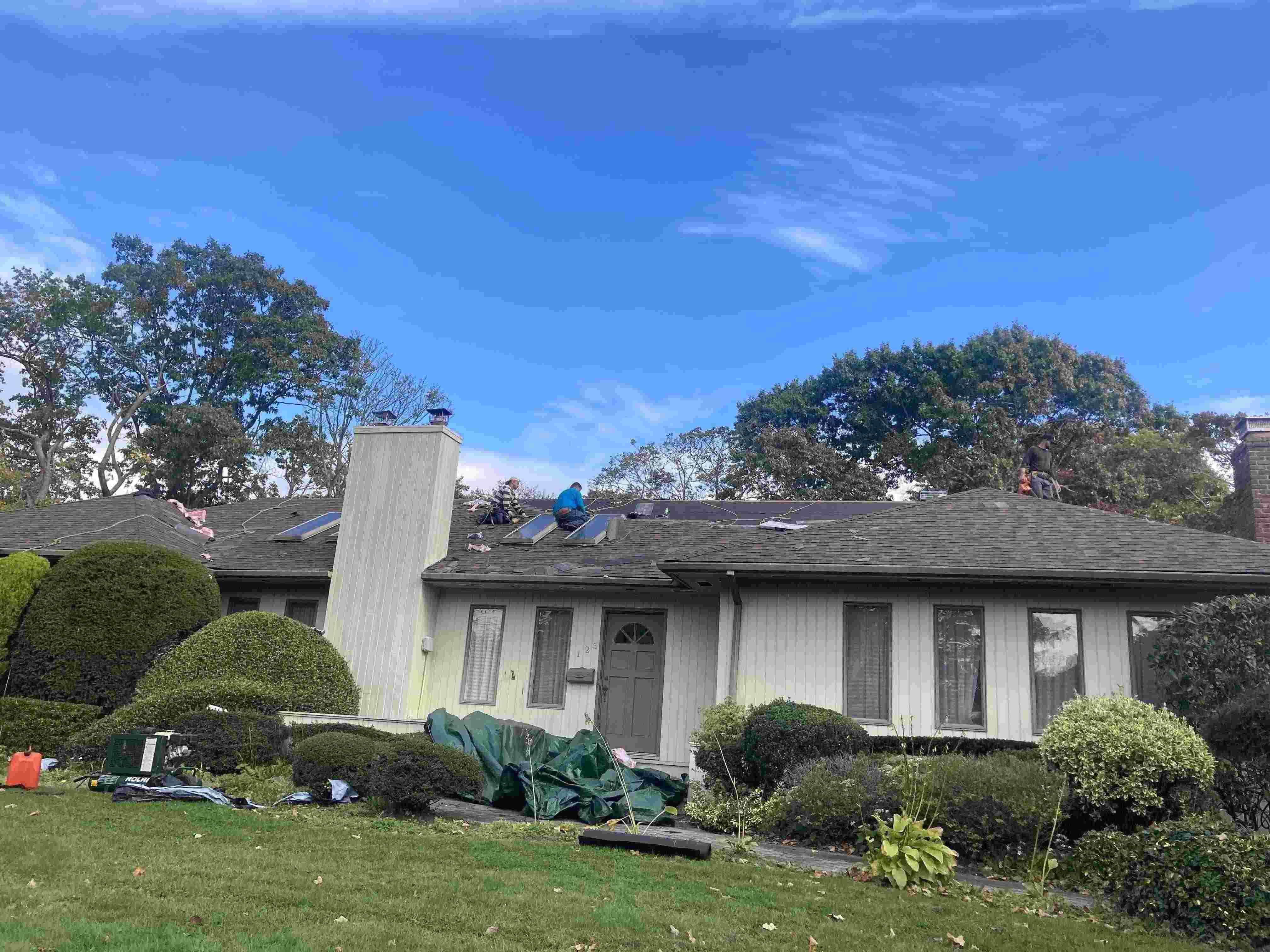 Working to install new roof